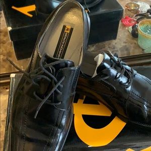 Black lace up dress shoes.